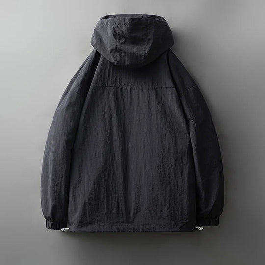Rui | Robuste wasserdichte Jacke mit sicheren Reißverschlusstaschen